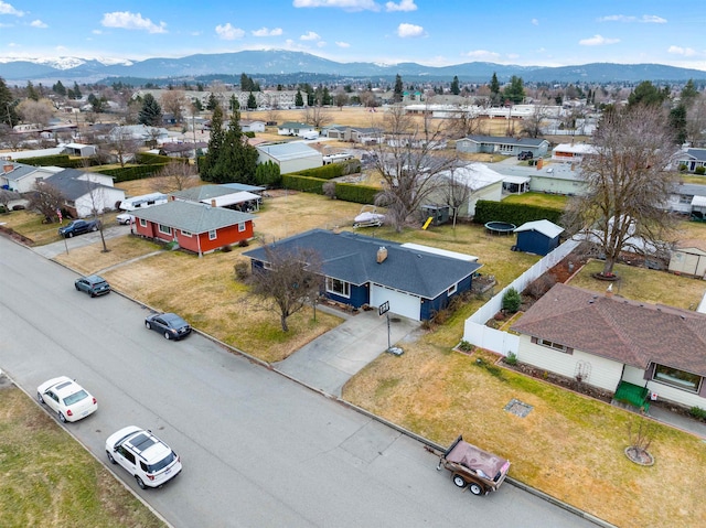 bird's eye view featuring a residential view and a mountain view