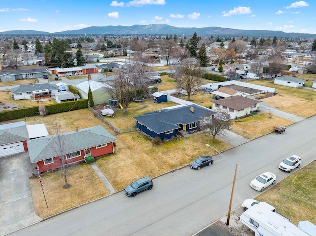 drone / aerial view with a residential view and a mountain view