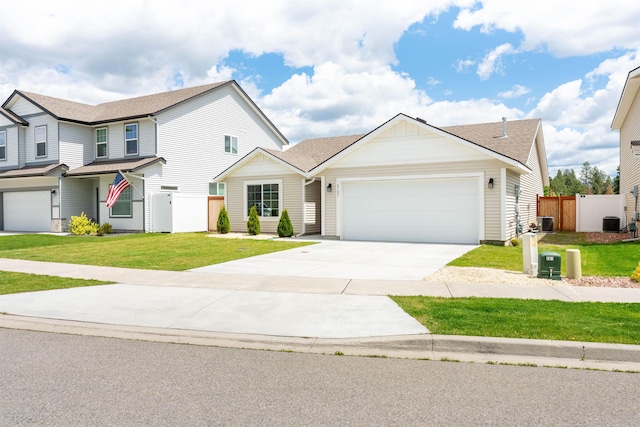 view of front of house featuring driveway, an attached garage, fence, a front lawn, and central AC