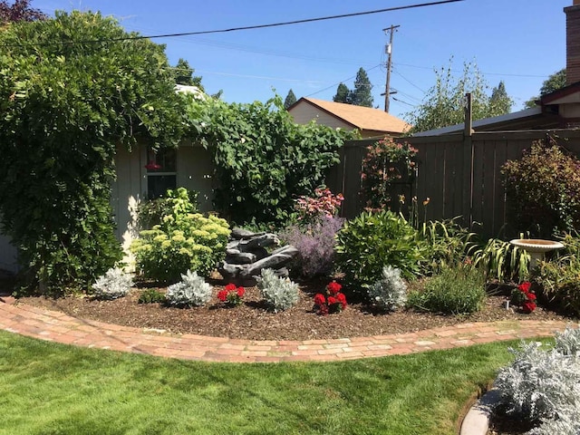 view of yard with fence