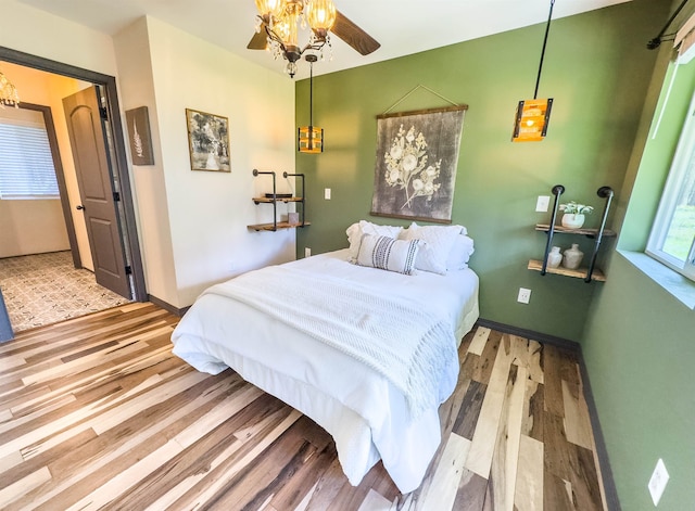 22410 S Ritchey Rd, Cheney, WA 99004 - bedroom featuring wood finished floors and baseboards