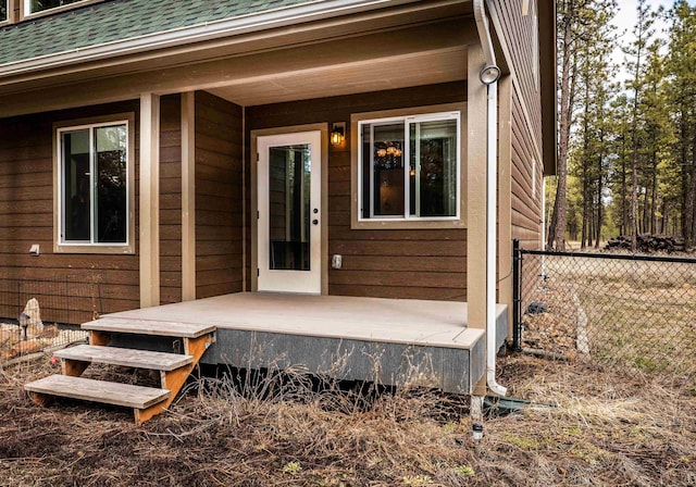 22410 S Ritchey Rd, Cheney, WA 99004 - doorway to property featuring fence and roof with shingles