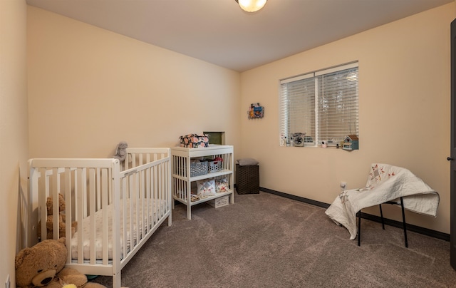 bedroom with baseboards and carpet flooring