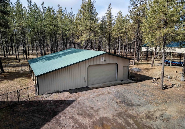 detached garage with fence