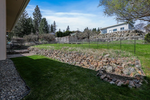 view of yard with fence