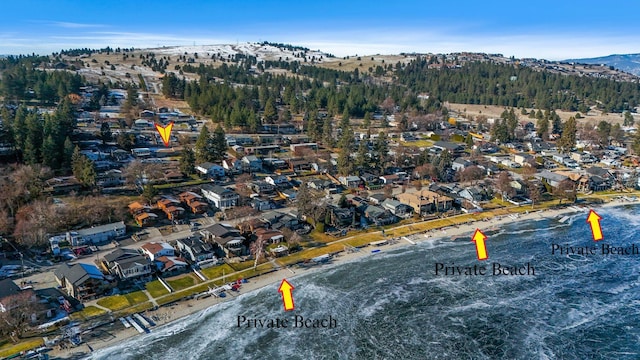 birds eye view of property with a residential view and a mountain view