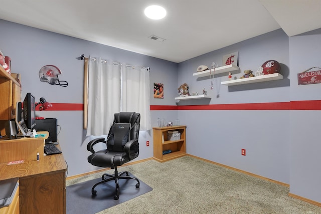 home office with carpet, visible vents, and baseboards