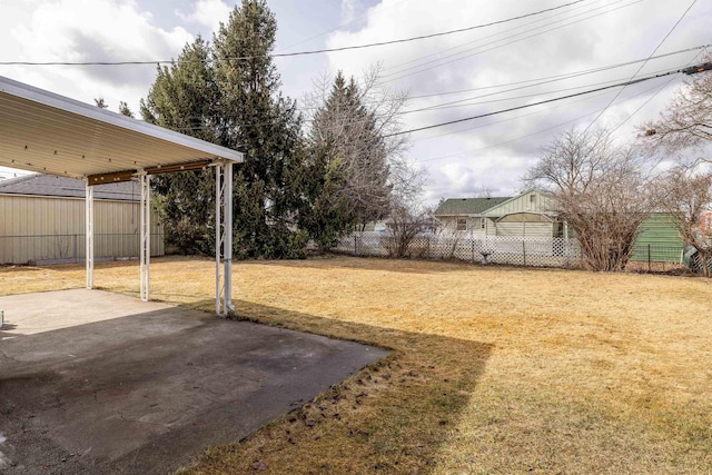 view of yard with a patio area and a fenced backyard