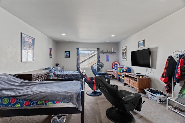 bedroom with carpet floors and recessed lighting