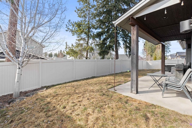 view of yard with a patio area and a fenced backyard