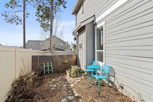 exterior space with a fenced backyard