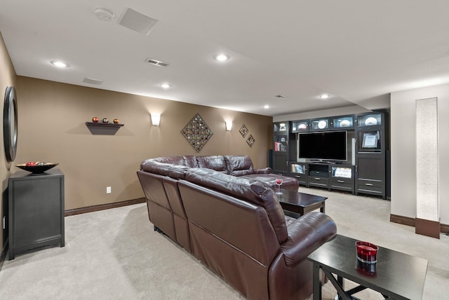 living room featuring recessed lighting, visible vents, baseboards, and light colored carpet