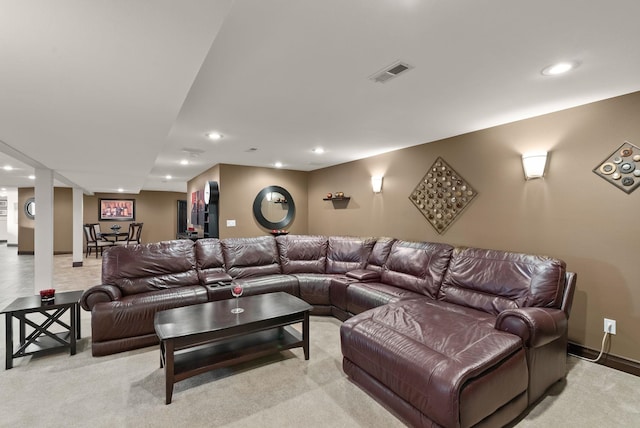 living area with light carpet, baseboards, visible vents, and recessed lighting