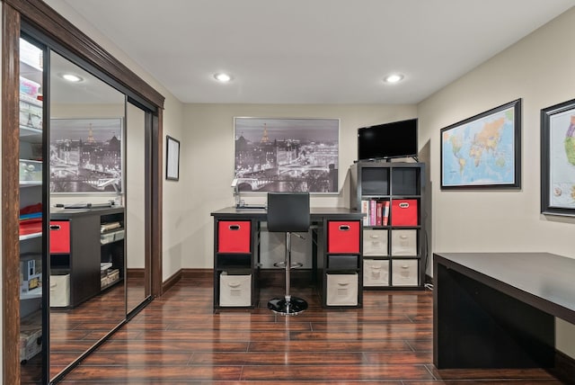 home office with baseboards, wood finished floors, and recessed lighting