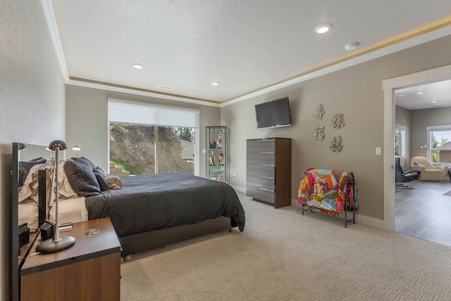 bedroom with carpet floors, baseboards, ornamental molding, and recessed lighting