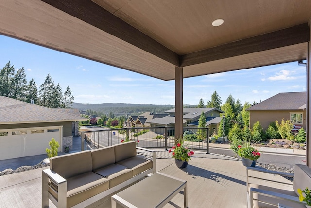 view of patio / terrace with a residential view and outdoor lounge area