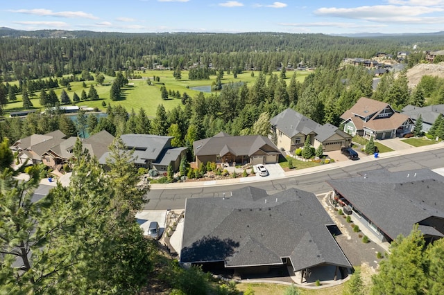 bird's eye view with a residential view and a view of trees