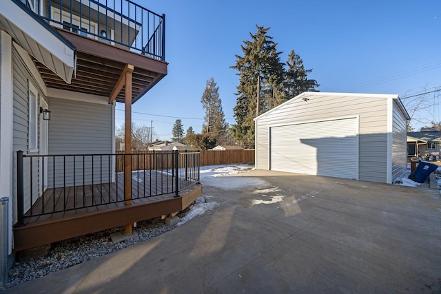 exterior space with driveway and fence