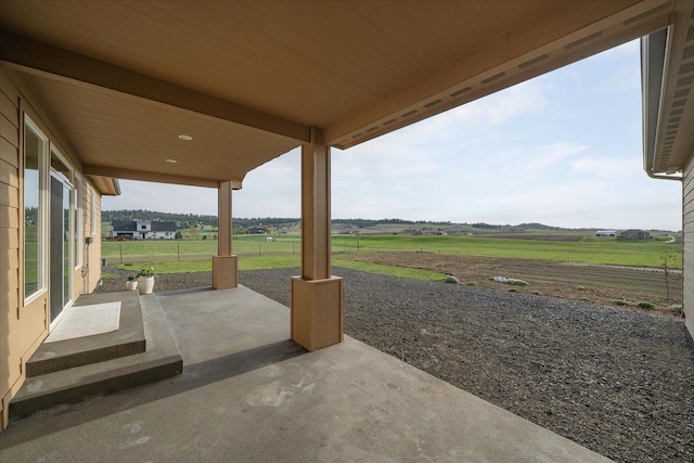 view of patio / terrace featuring a rural view