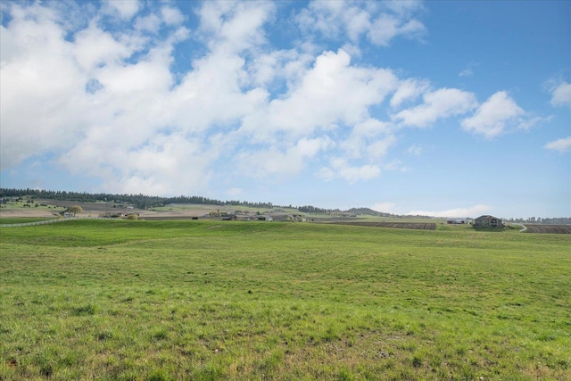 exterior space with a rural view