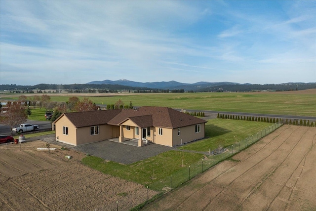 exterior space with a mountain view and a rural view