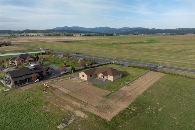 drone / aerial view with a rural view and a mountain view