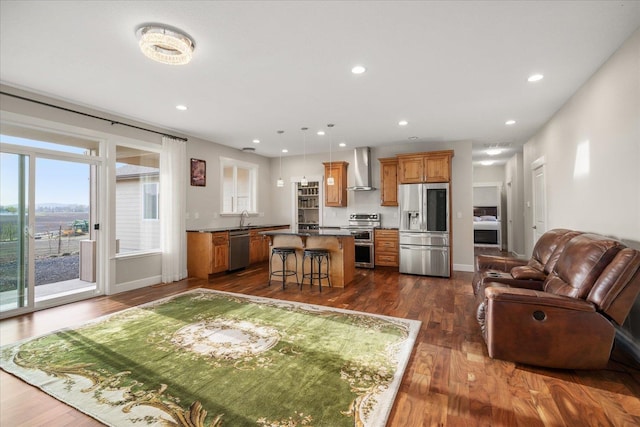 living room featuring dark wood-style floors, recessed lighting, and baseboards