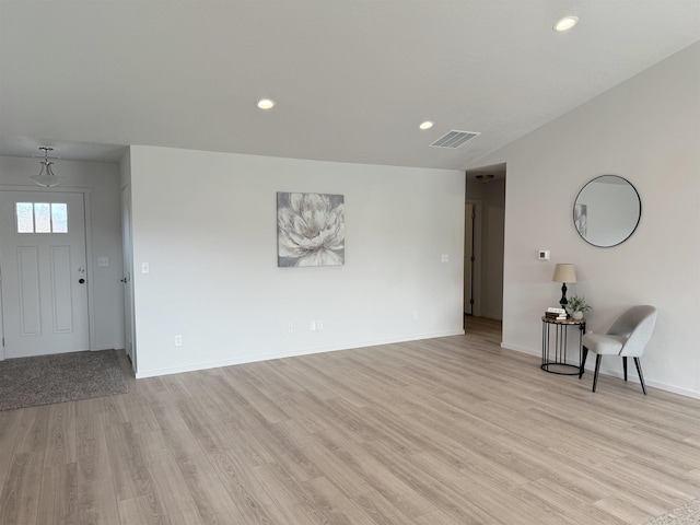 interior space featuring visible vents, recessed lighting, light wood-type flooring, and baseboards