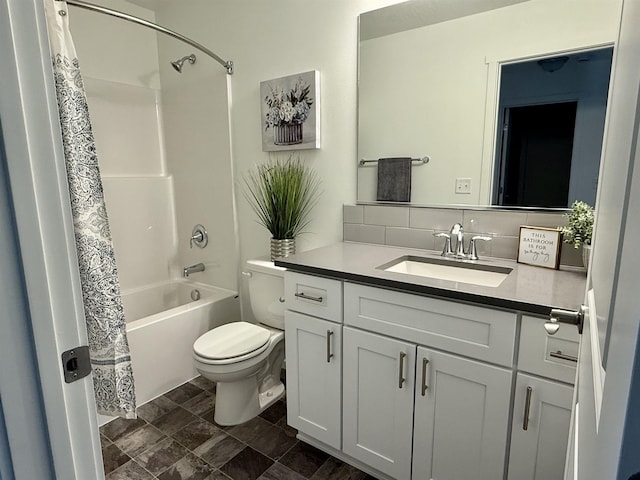 bathroom featuring shower / bath combo, backsplash, toilet, and vanity