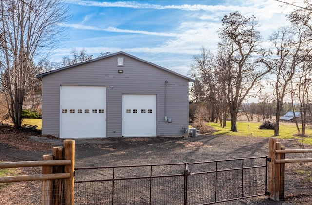 detached garage with fence