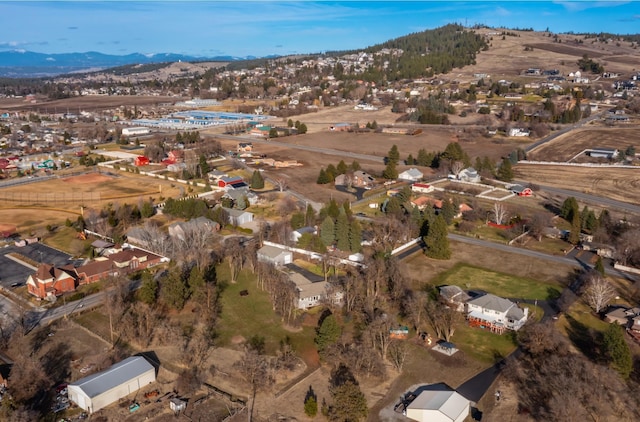 drone / aerial view featuring a mountain view