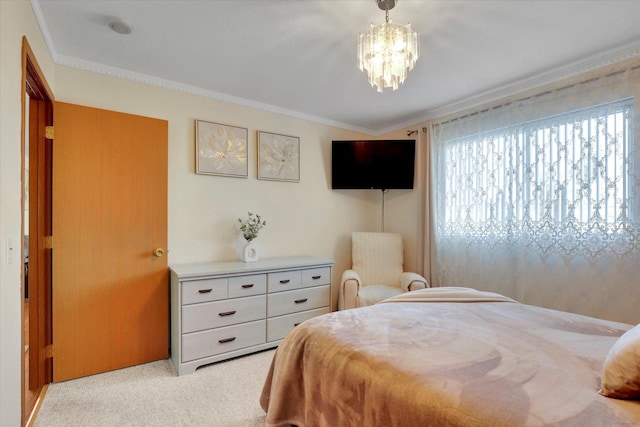 bedroom featuring light carpet, ornamental molding, and a chandelier