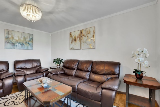 living area featuring a notable chandelier, crown molding, and wood finished floors