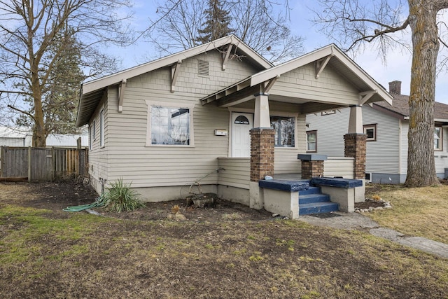 view of front of property with fence