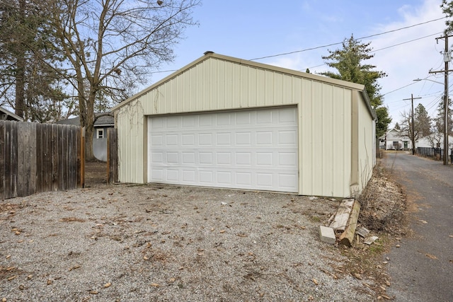 detached garage with fence