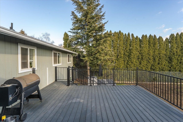 wooden terrace with area for grilling