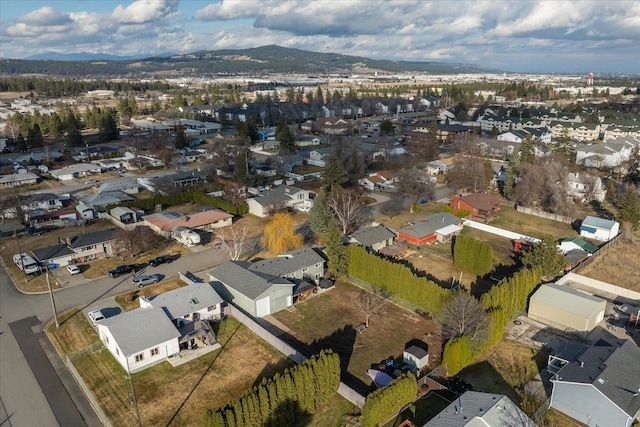 birds eye view of property with a residential view and a mountain view