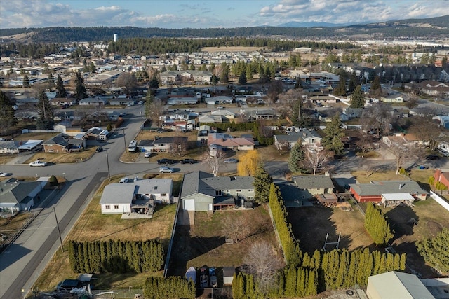 birds eye view of property with a residential view