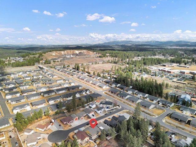 bird's eye view featuring a residential view and a mountain view