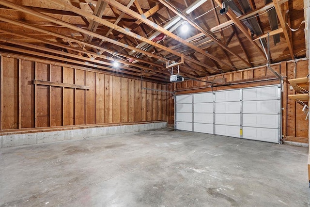 garage featuring a garage door opener