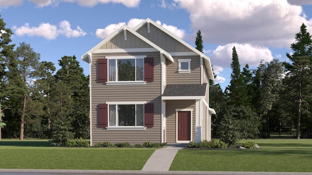 view of front facade featuring roof with shingles and a front yard