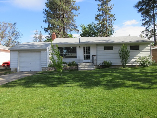 single story home with a front yard, driveway, a chimney, and an attached garage