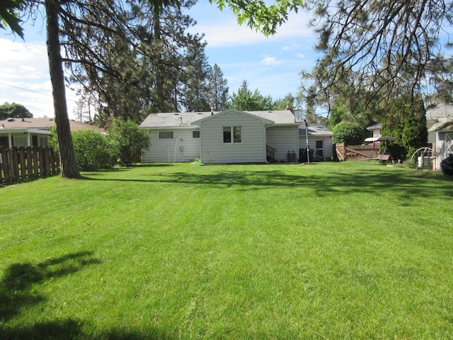 view of yard featuring fence