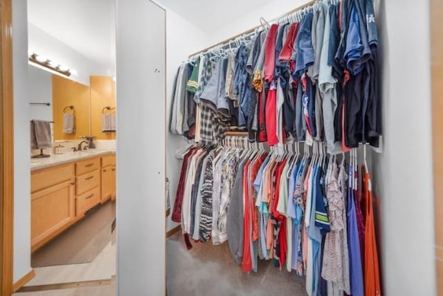 spacious closet with a sink