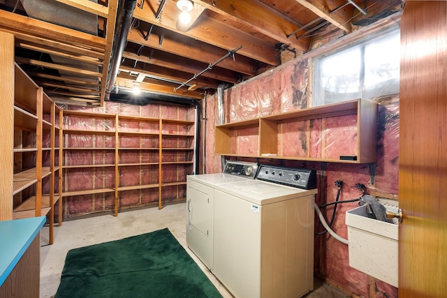 laundry area featuring laundry area and washer and clothes dryer