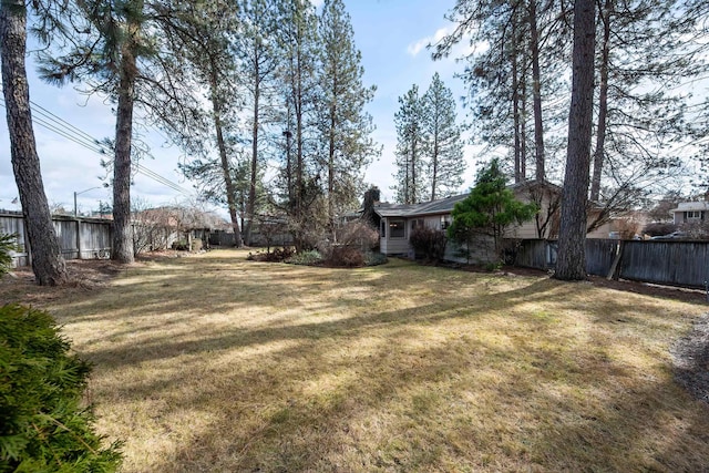 view of yard with fence