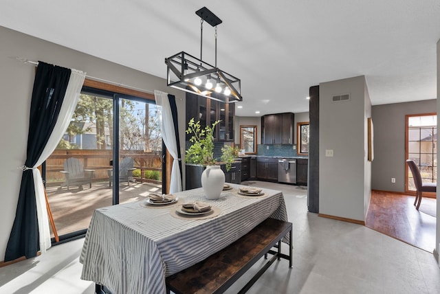 dining space featuring baseboards, visible vents, and recessed lighting