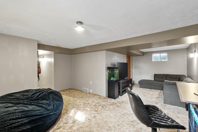 carpeted living room with visible vents