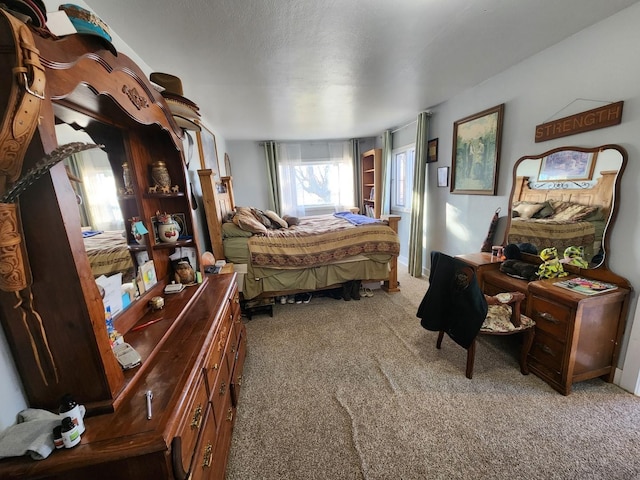 bedroom featuring light colored carpet