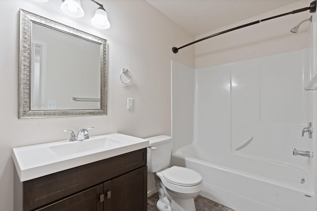 bathroom featuring toilet, shower / bathtub combination, and vanity